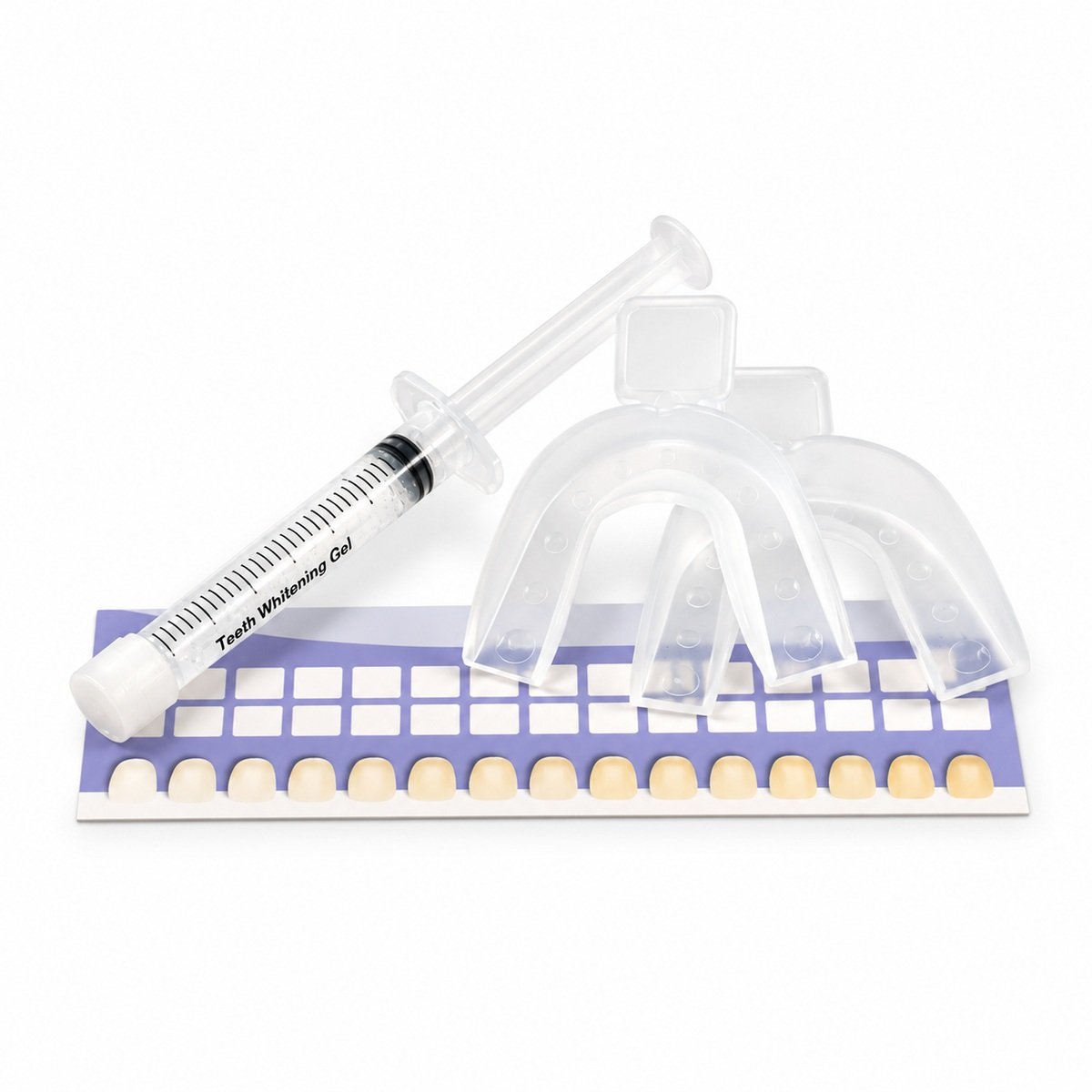 Clear whitening gel syringe beside transparent mouth trays and a purple and white teeth shade guide