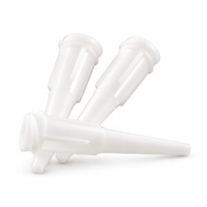 Three white plastic dental applicator tips on a white background